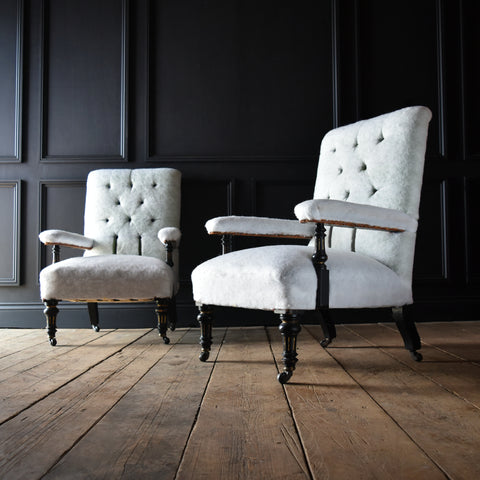 Pair of English 19th Century Ebonised Open Armchairs. Inclusive of Upholstery.