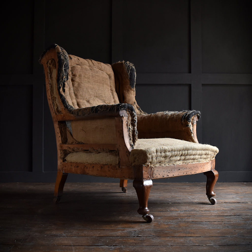Late 19th Century English Wingback Armchair. Upholstery Inclusive.