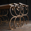 Nest of French Mid-Century Gilded Iron Mirrored Top Tables.