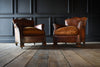 Pair Of French Deco Moustache Back Leather Armchairs.