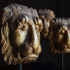 Three 19th Century Italian Gilt wood Lion Masks on Stands.