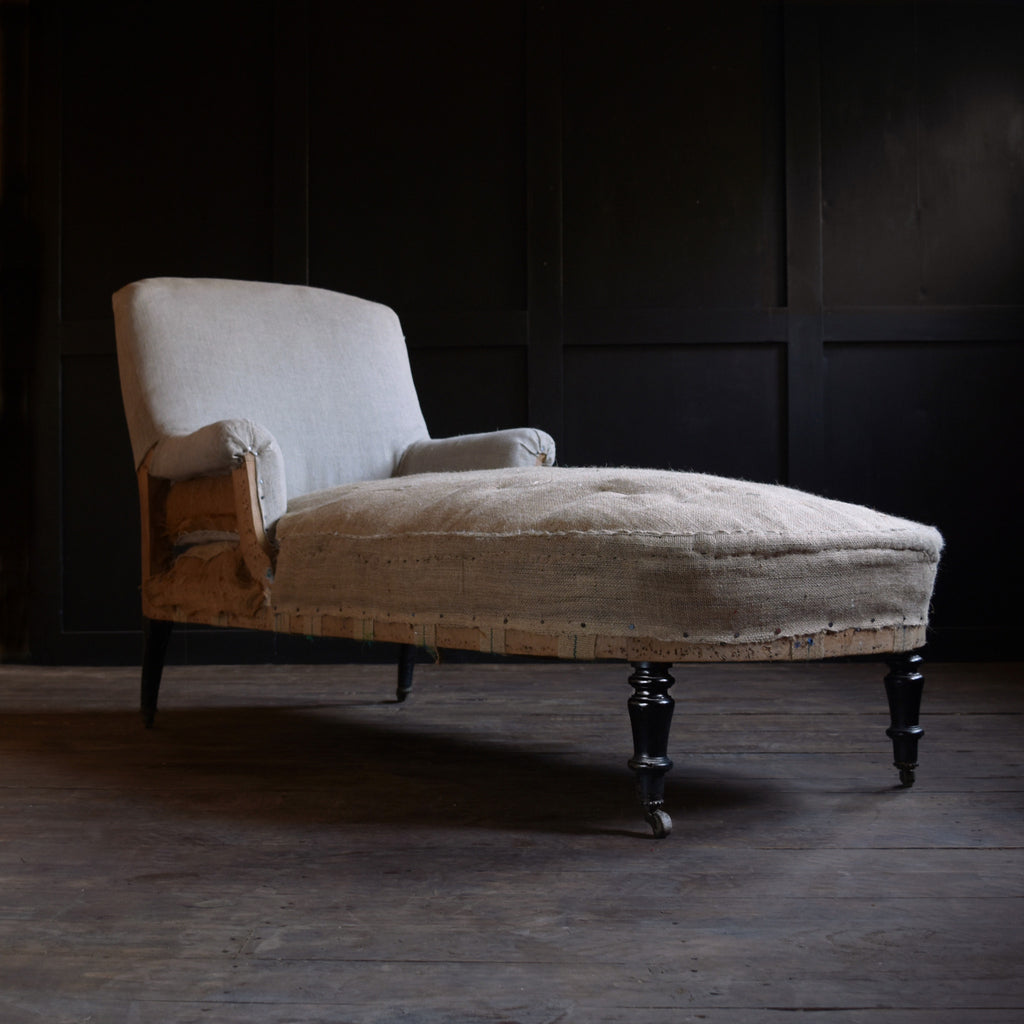 19th Century French Ebonised Chaise Longue. Upholstery inclusive.