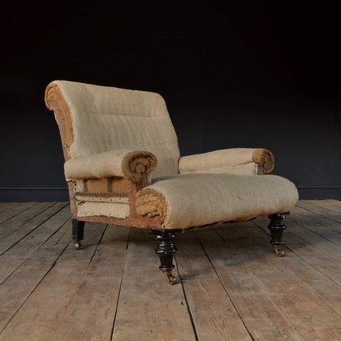 A Good 19th Century Ebonised Scroll Back Library Armchair. Upholstery Inclusive.