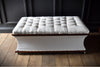Large 19th Century English Button Top Ottoman. Upholstery inclusive.