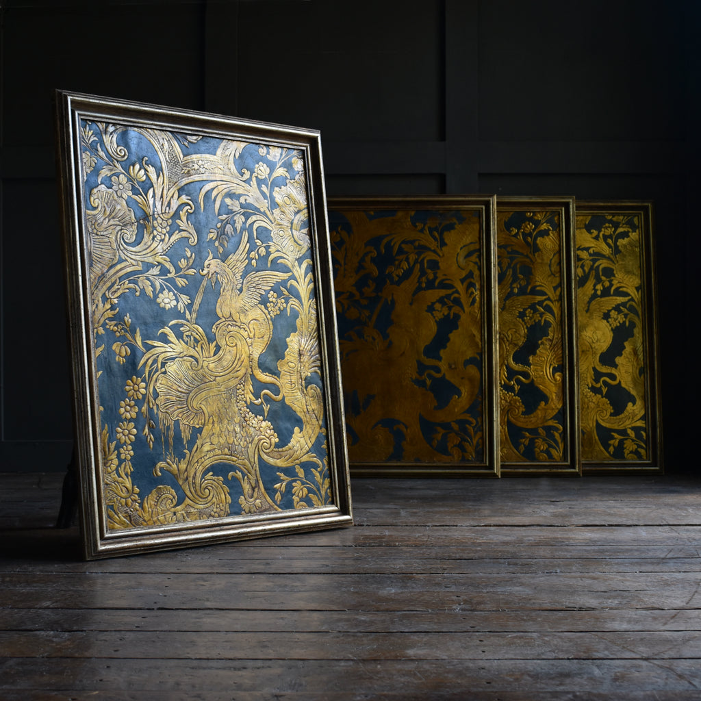 A set of Four 18th Century Spanish Embossed Leather Panels.
