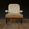 A Good 19th Century English Ebonised Button Back Library Armchair, Upholstery Inclusive.