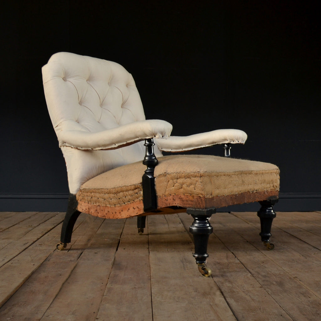 A Good 19th Century English Ebonised Button Back Library Armchair, Upholstery Inclusive.