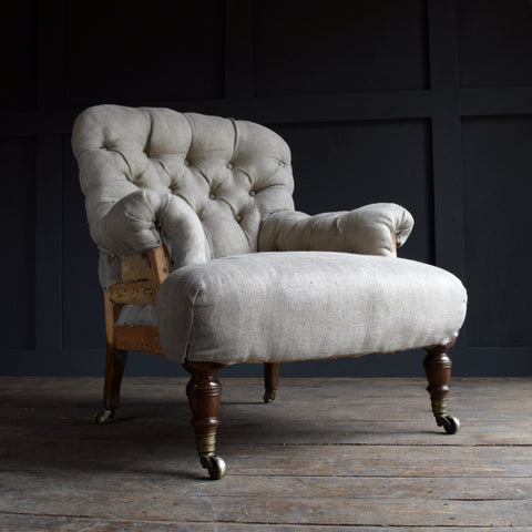 Howard & Sons London Button back Armchair, Circa 1880. Upholstery inclusive.