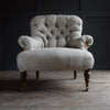 Howard & Sons London Button back Armchair, Circa 1880. Upholstery inclusive.