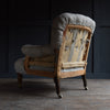 Howard & Sons London Button back Armchair, Circa 1880. Upholstery inclusive.