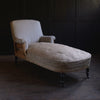 19th Century French Ebonised Chaise Longue. Upholstery inclusive.