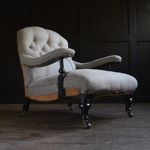 19th Century English Ebonised Library armchair. Upholstery Inclusive.