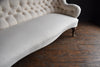 19th Century English Serpentine Two Seat Sofa. Upholstery inclusive.