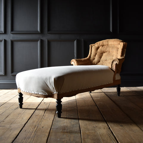 Napoleon III French Ebonised Chaise Longue. Upholstery inclusive.