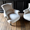 Shapely Pair of French Ebonised Armchairs. Circa 1900. Upholstery inclusive.