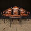 A Set of Six Excellent Mid Century Italian Iron and Leather Stacking Arm Chairs.